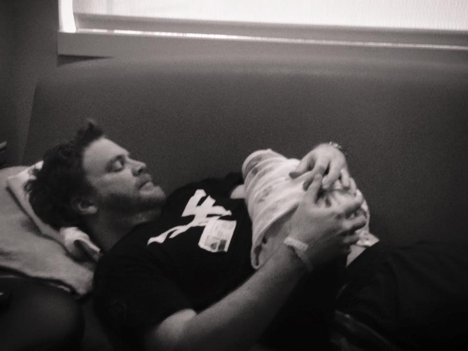 Carlisle Kellam Holding Baby